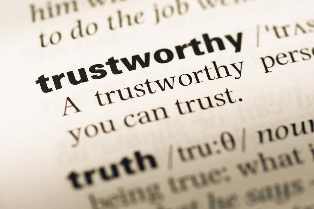 A Dictionary page with the definition of Trustworthy